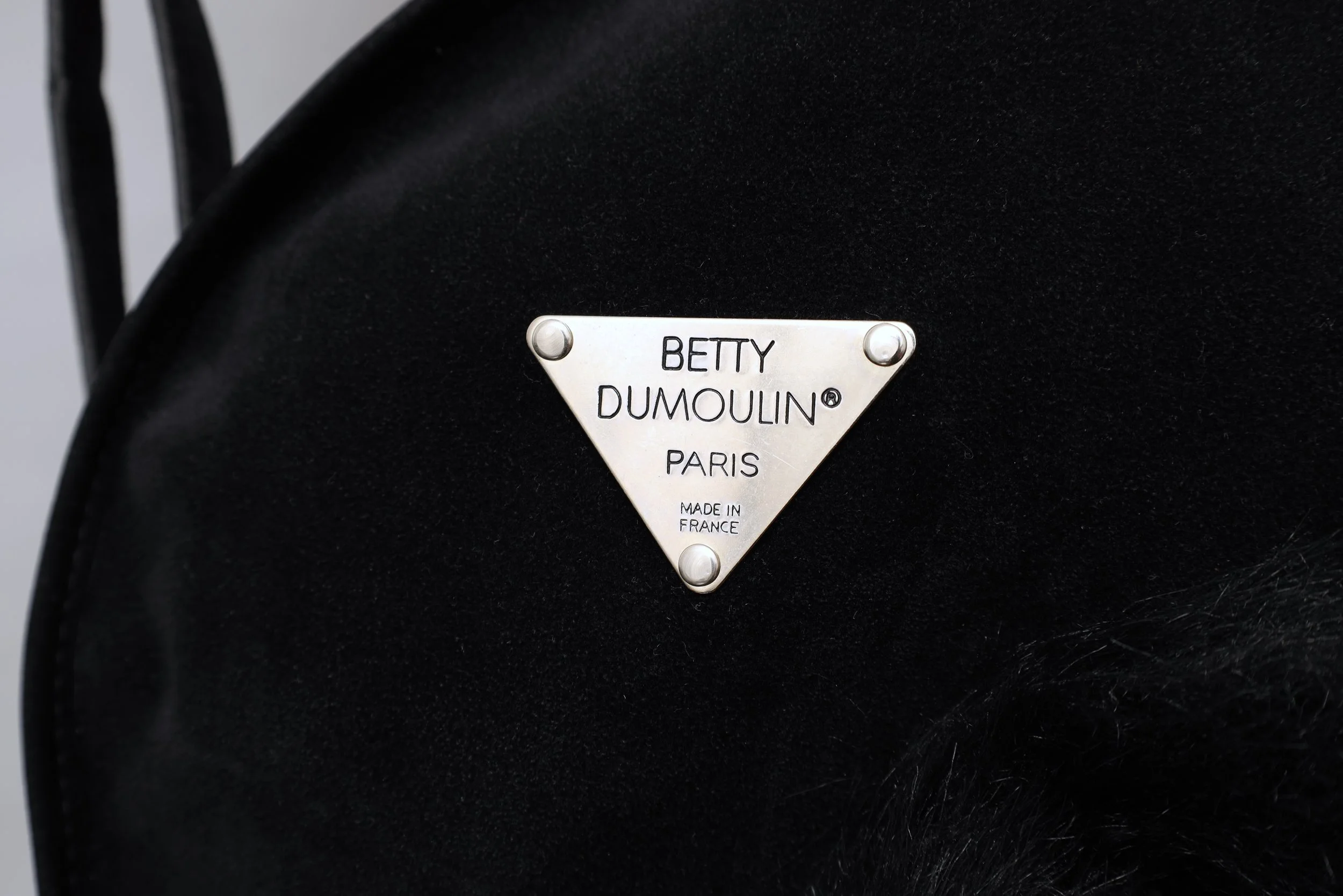 late 1980s / early 1990s Betty Dumoulin metal label tag