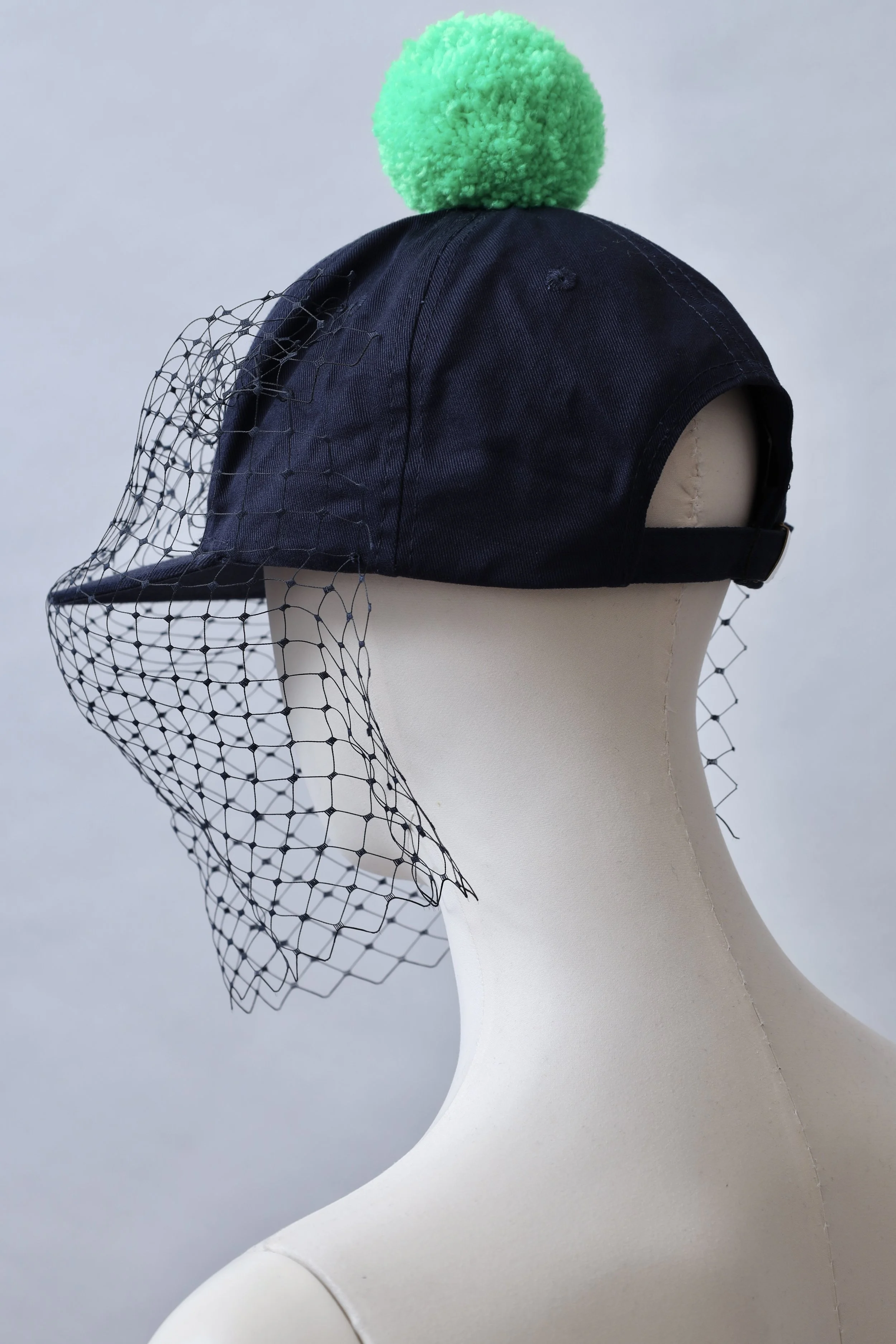 S/S 2016 Piers Atkinson navy blue veil baseball cap with acid green pom pom