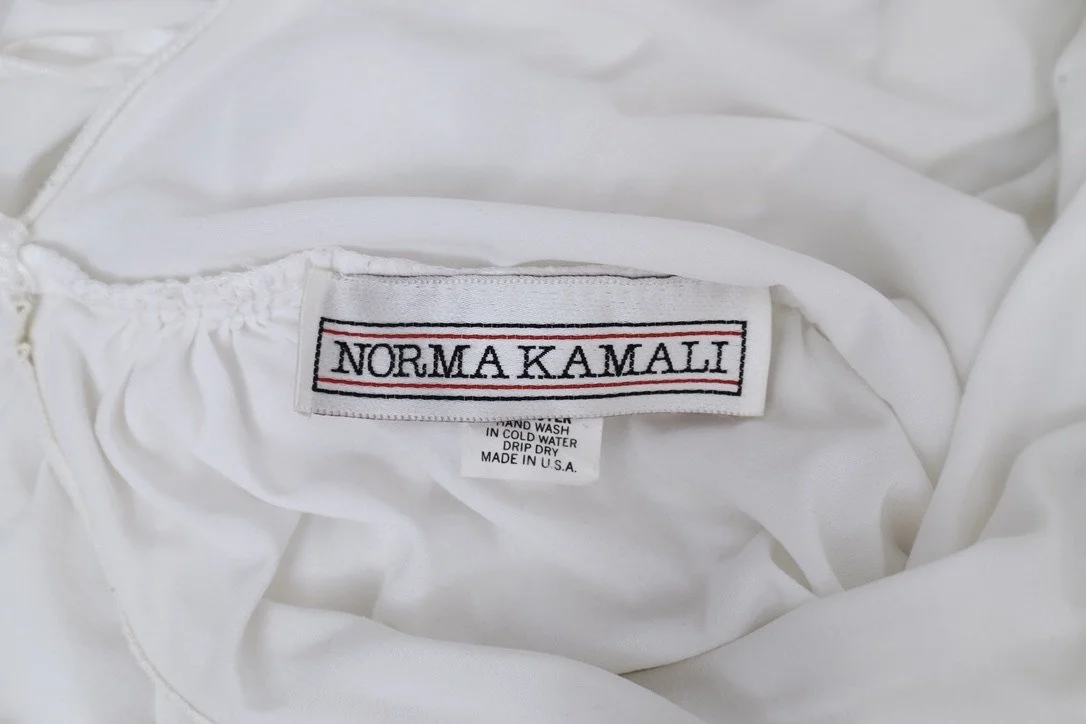 1980s Norma Kamali label tag
