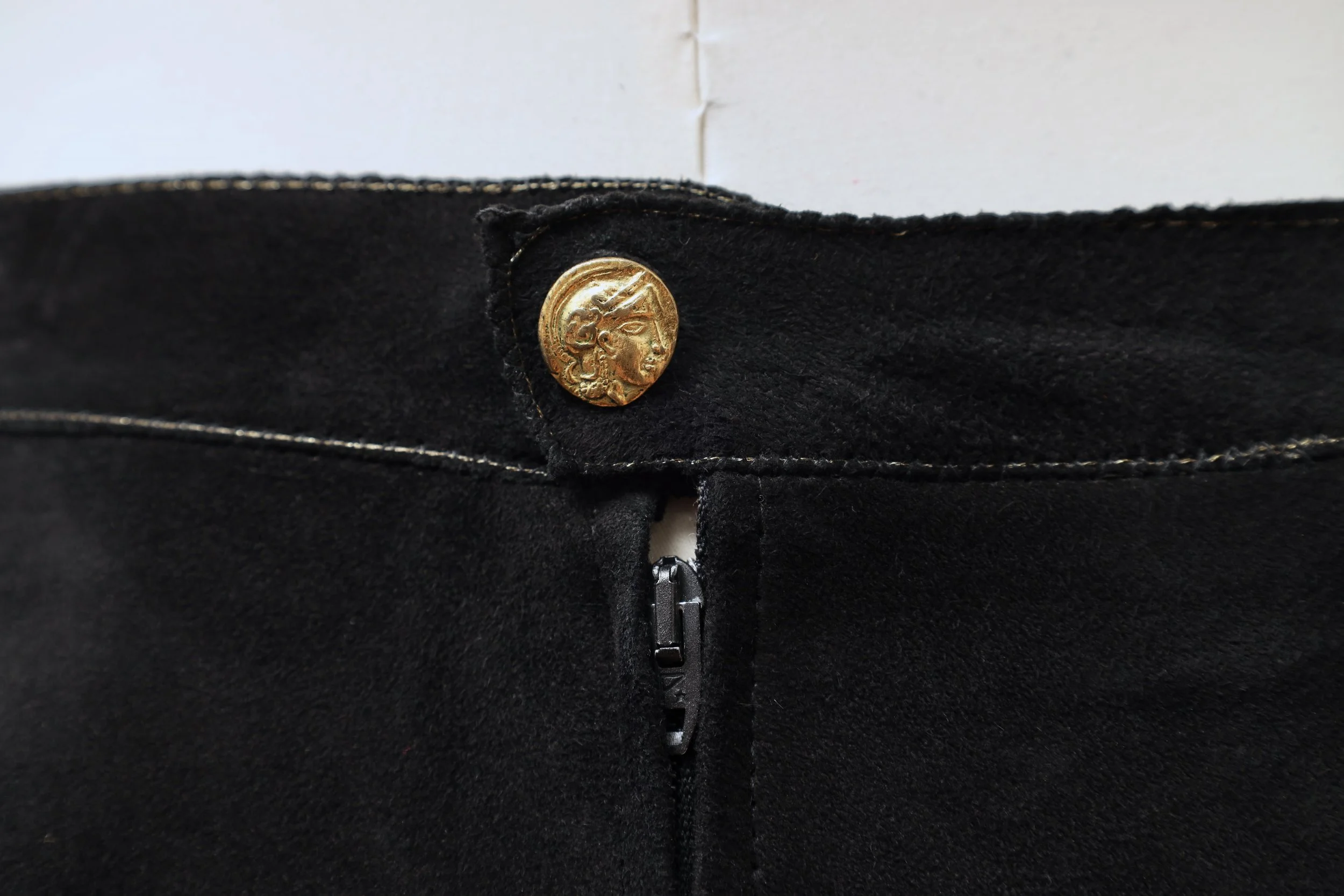 1970s Roberto Cavalli black suede gold button
