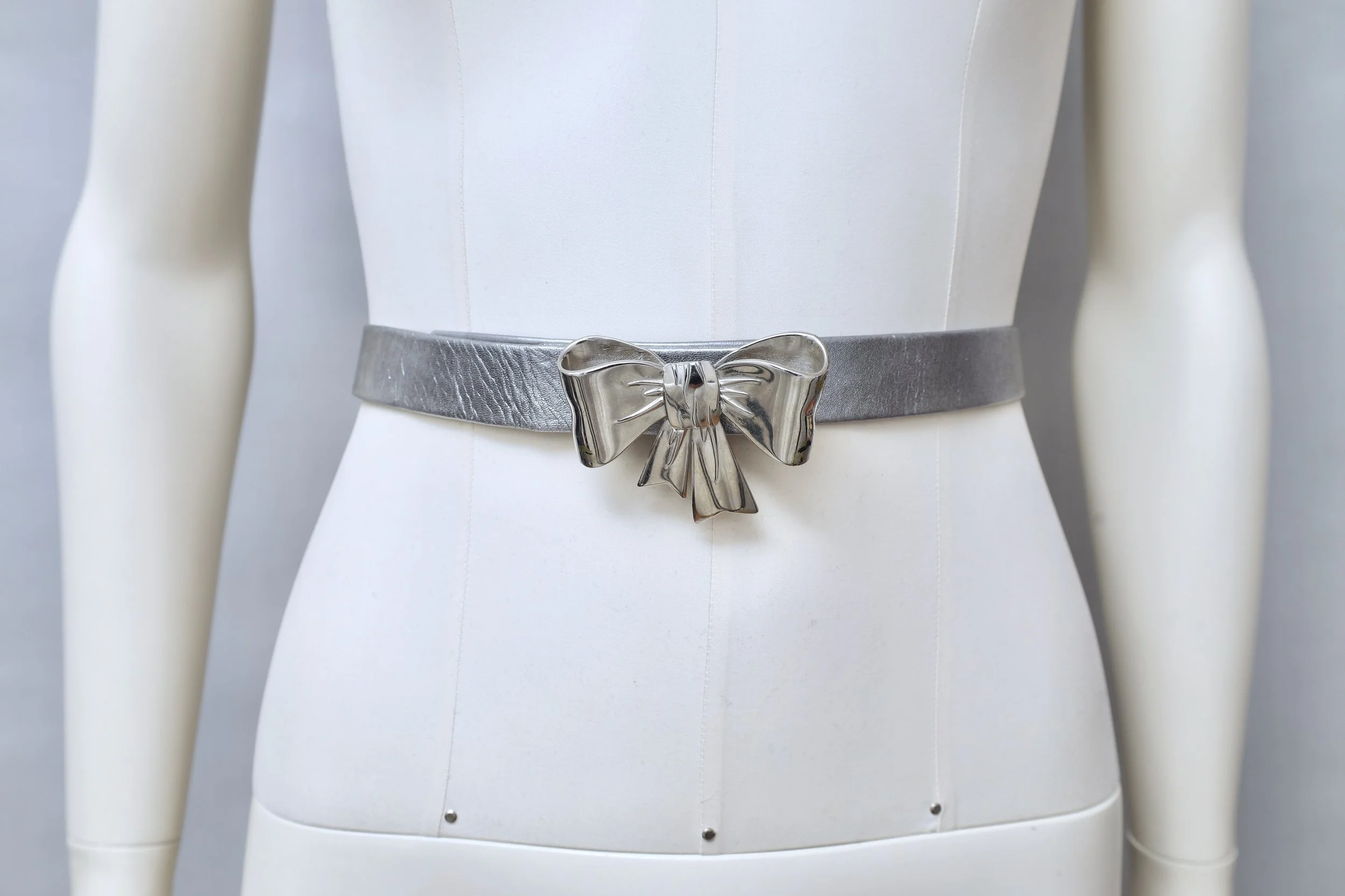 1980s Chantal Thomass silver bow faux leather waist belt