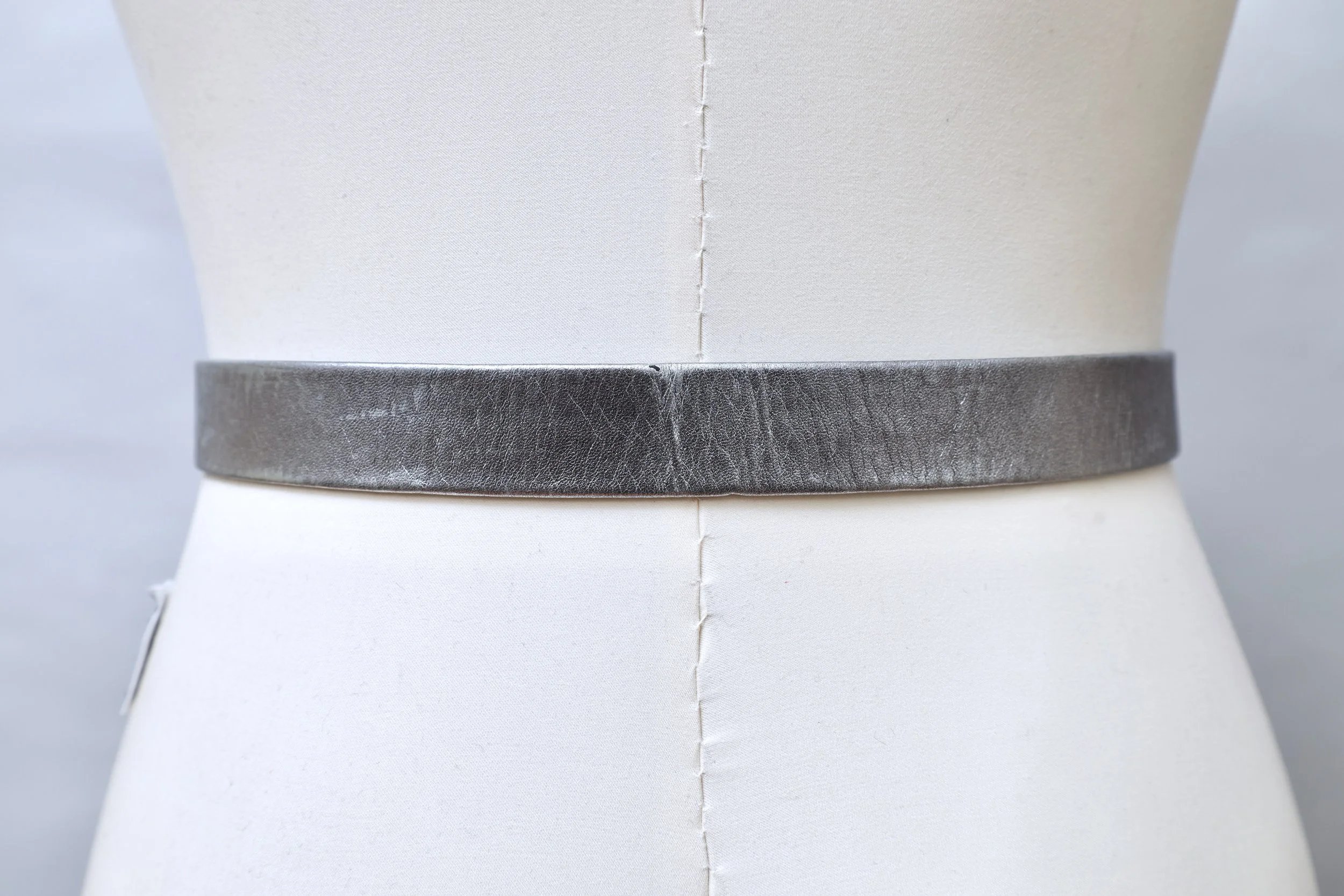 1980s Chantal Thomass silver bow faux leather waist belt