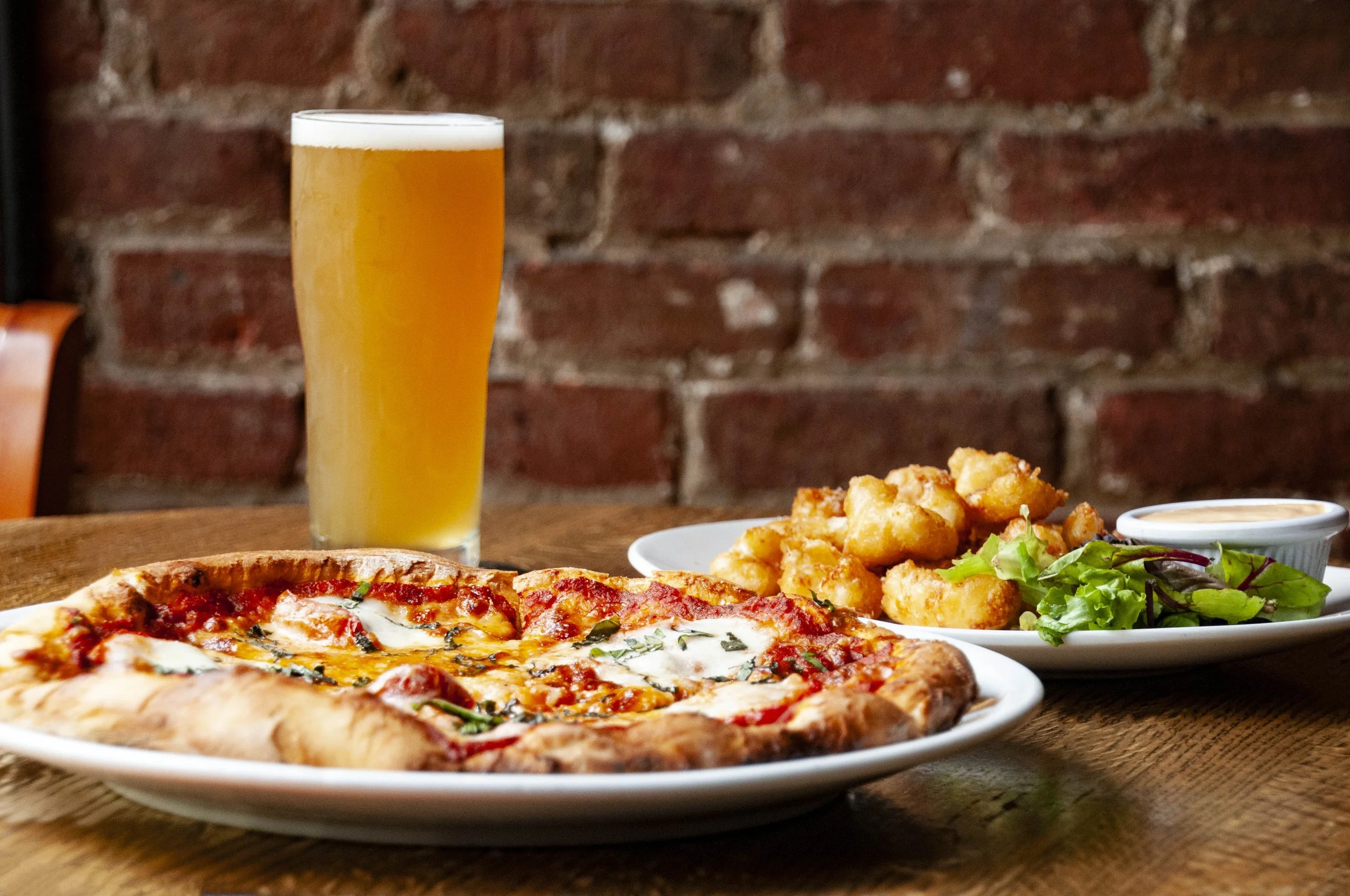 A spread of food at Grizzly Peak Brewing Co in Ann Arbor, Michigan.