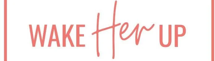 Text saying 'WAKE Her UP' with 'WAKE' and 'UP' in bold uppercase letters and 'Her' in script font.
