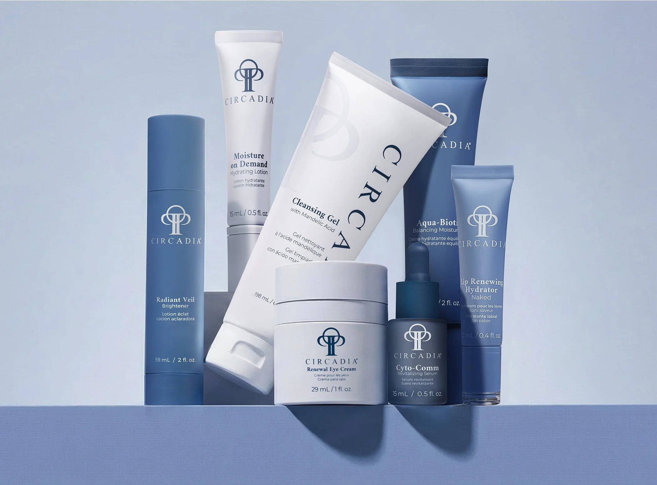 Collection of Circadia skincare products including moisturizing lotion, eye cream, serum, and hydrating gel in blue and white packaging with the Circadia logo.