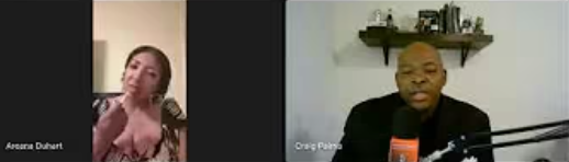 Split-screen video call with a woman on the left and a man on the right; woman appears to be speaking, man is seated with a microphone, both in indoor settings.