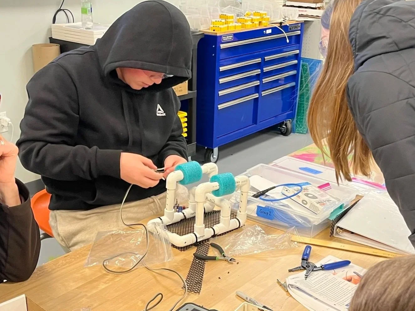 SeaPerch submersible remote operated vehicle (or ROV) being assembled by students at the St. George School.
