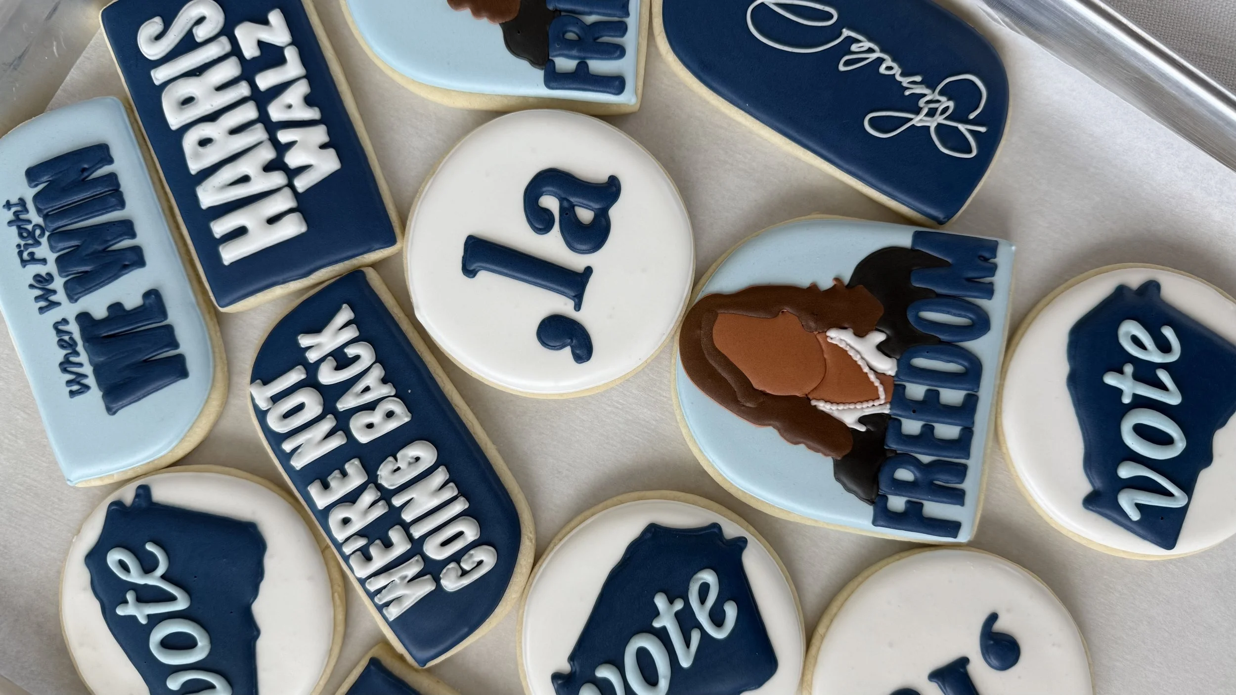 Decorated cookies with messages and images celebrating a 13th birthday, including a girl with brown hair and a necklace, and the words '13,' 'Happy,' and 'Birthday'.
