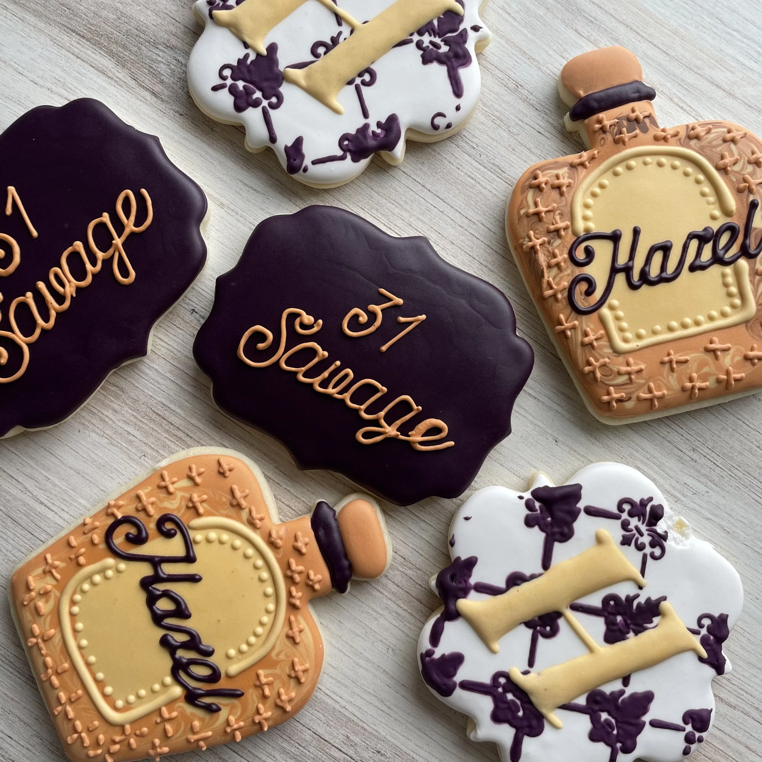 Decorated cookies with theme related to appreciation, graduation, and congratulation messages, featuring words like 'Thank You,' 'Congrats,' and 'Hooray.'