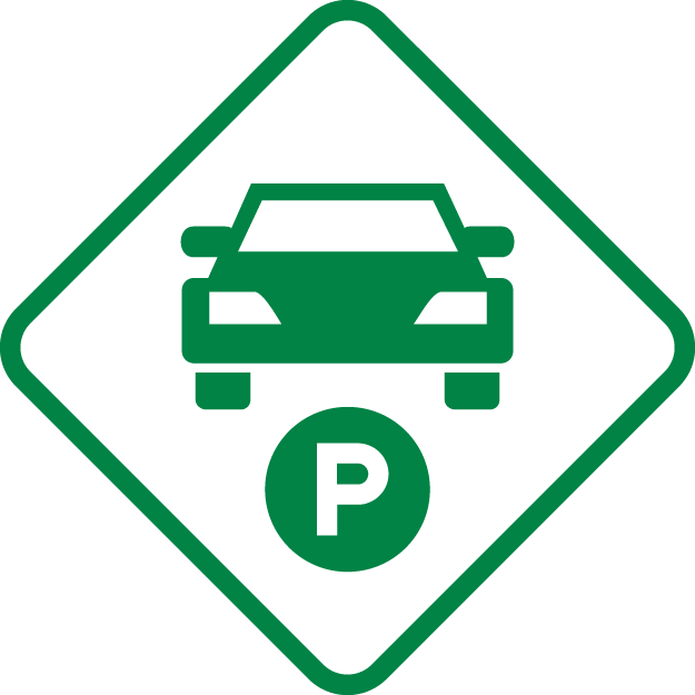 Green parking and driving direction sign with a car icon and a P for parking.