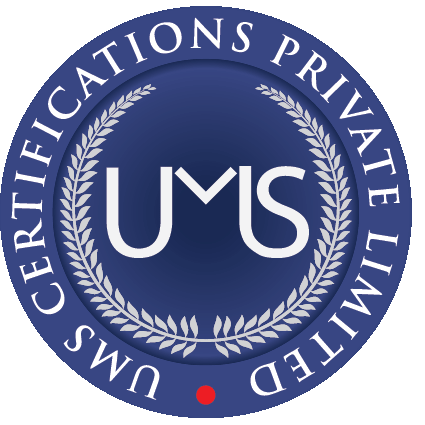 A circular badge with a dark blue background and white text that reads 'UMS CERTIFICATIONS PRIVATE LIMITED' around the outer edge. Inside, there is a laurel wreath surrounding the abbreviation 'UMS' in bold white letters. A small red dot is at the bottom center of the badge.