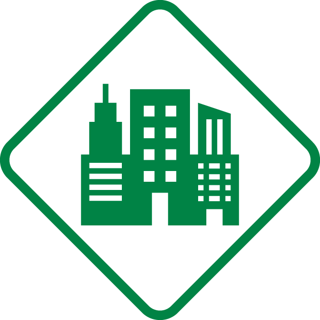 Green cityscape icon featuring various buildings inside a diamond-shaped border