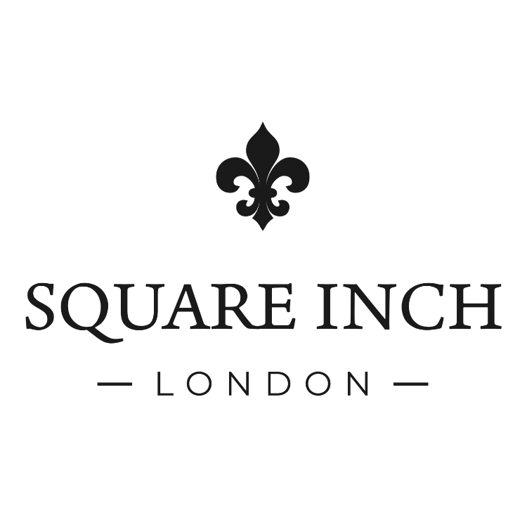 Logo of Square Inch London with a fleur-de-lis symbol above the text.