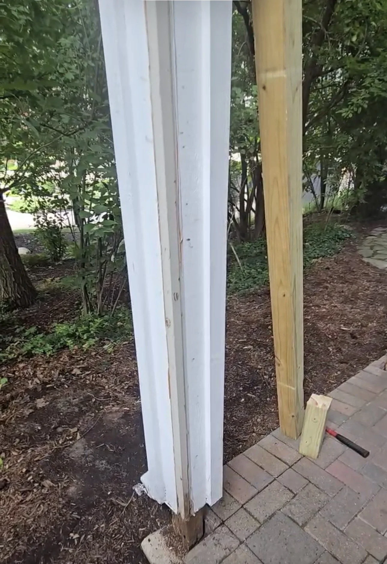 Chuck McGee prepared to replace a rotted second story balcony support post.
