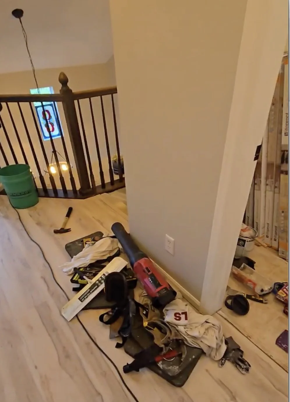 Vinyl Plank Flooring installation with baseboard moulding, and interior painting throughout.
