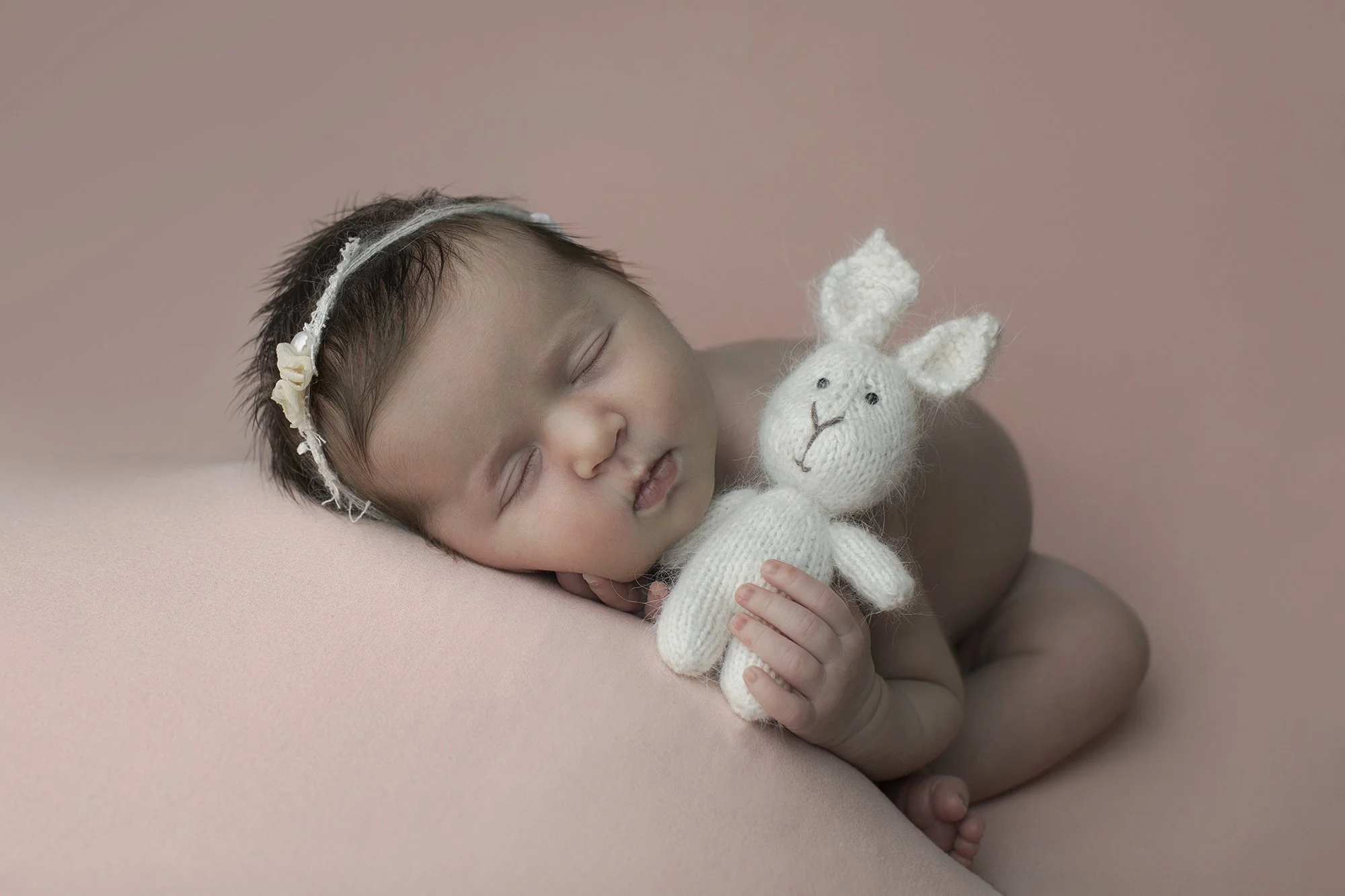 Newborn session with small bunny