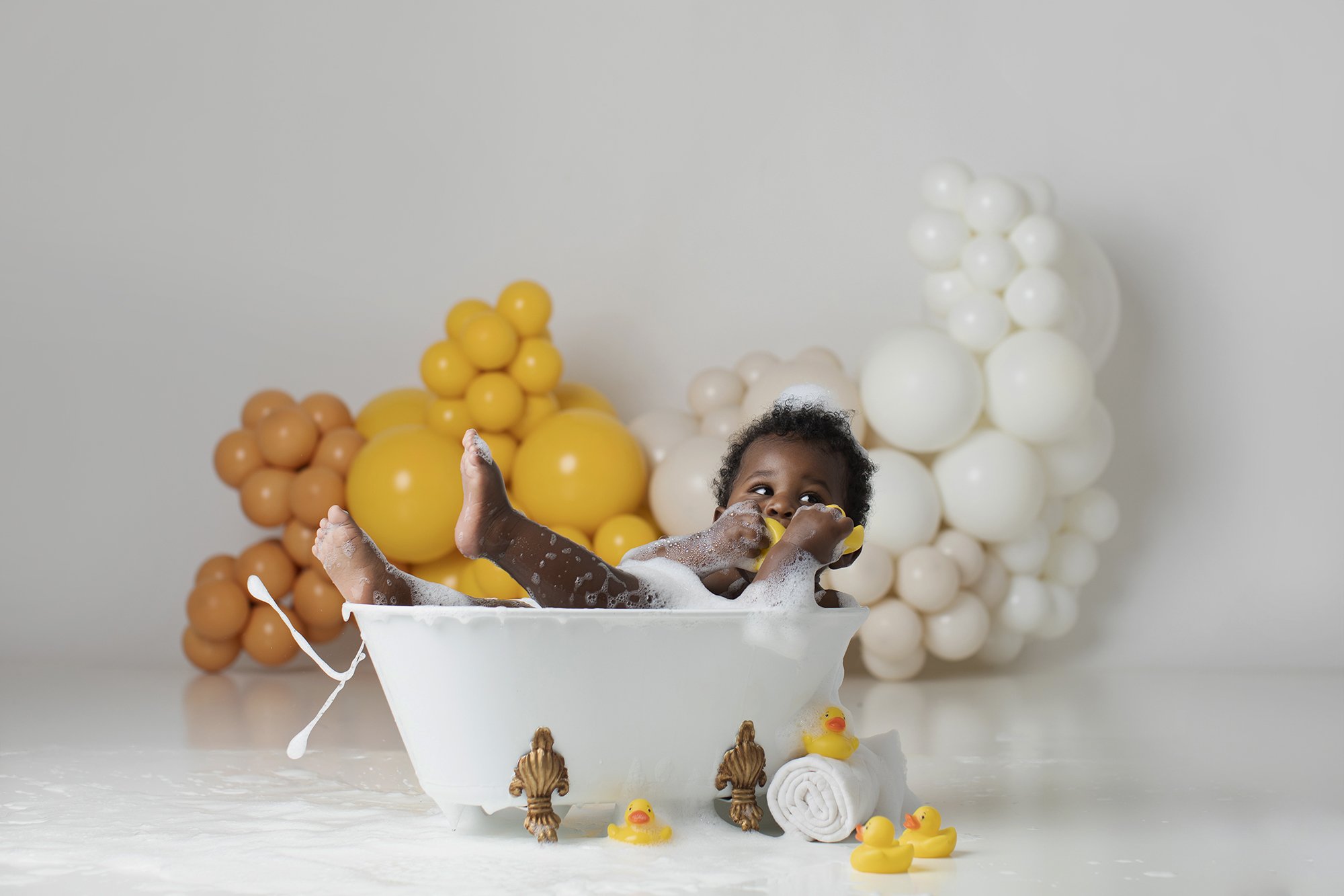 fun cake smash photography with bath time