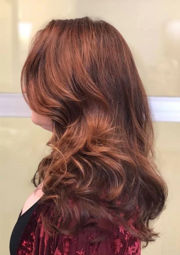 curly layered redbrown cut.jpg