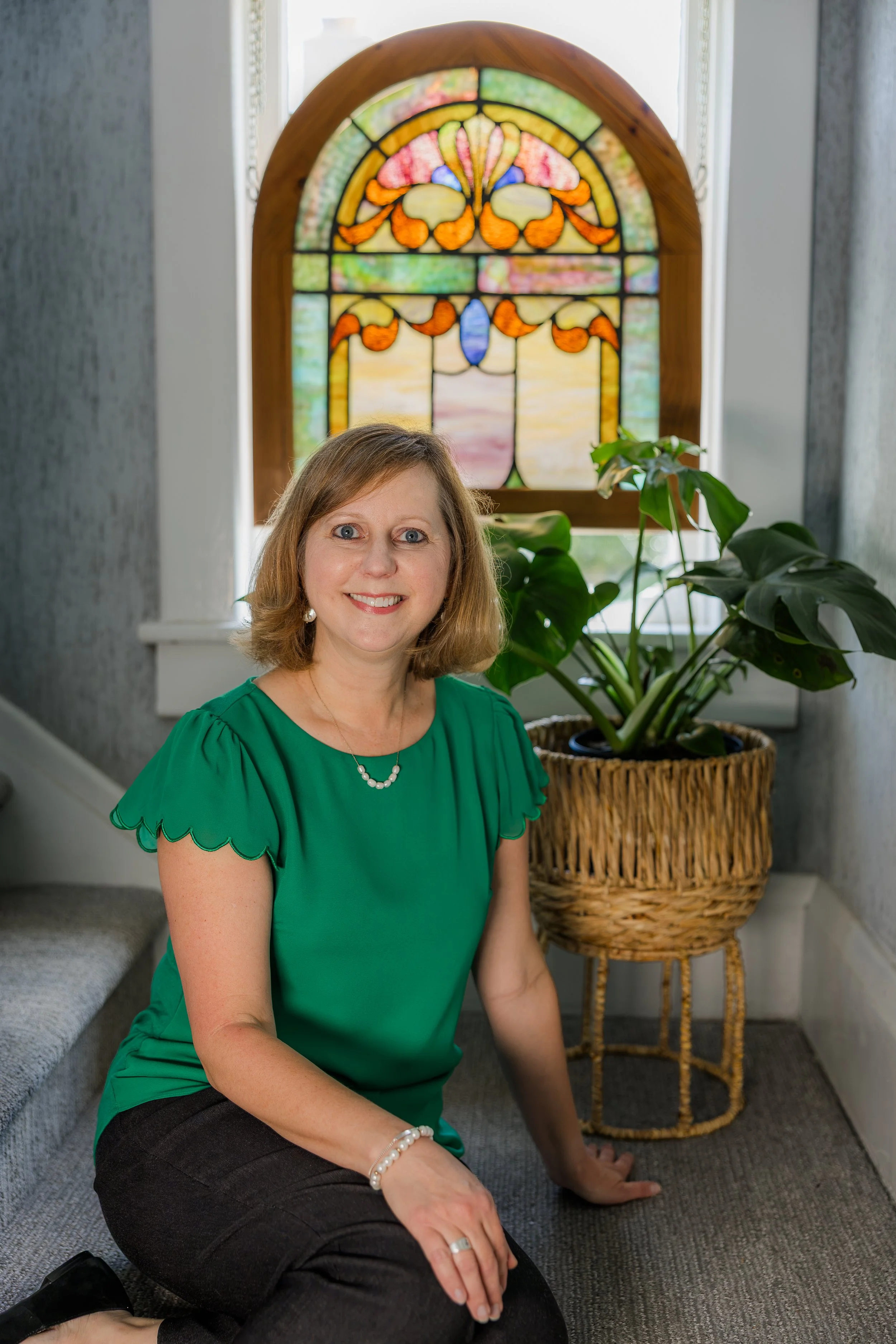 Claire Barnett at Nurture Counseling Services office interior in Greenville, South Carolina