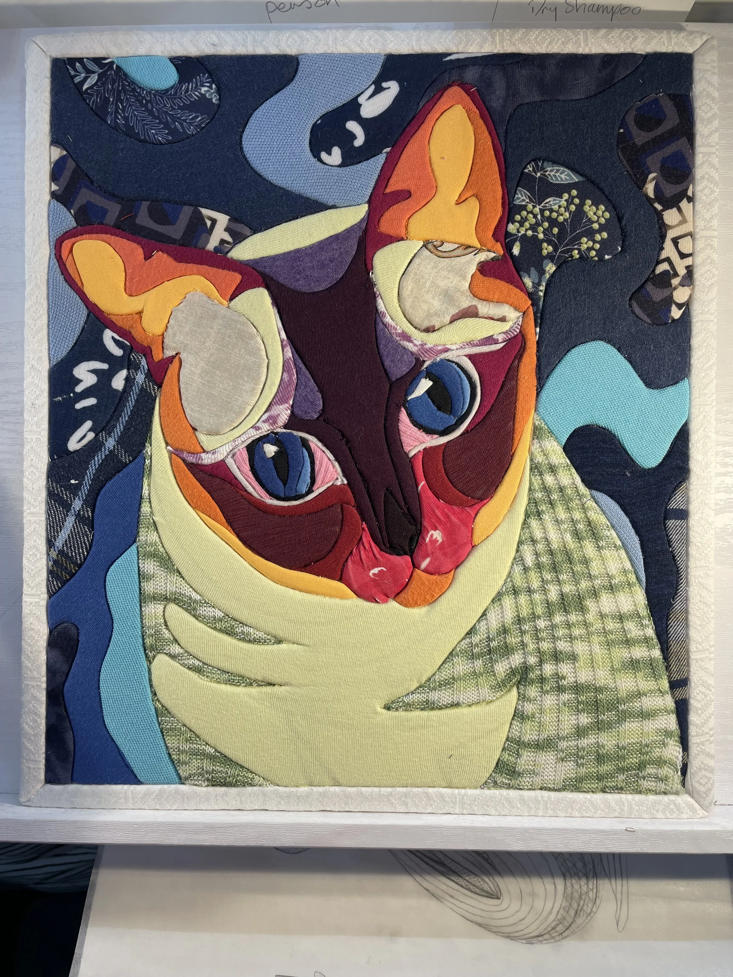 "Loki". My first attempt at a larger piece, playing around with a colourful version of my cat.  This piece is is foam board and became the showcase piece used in my volunteering workshops.