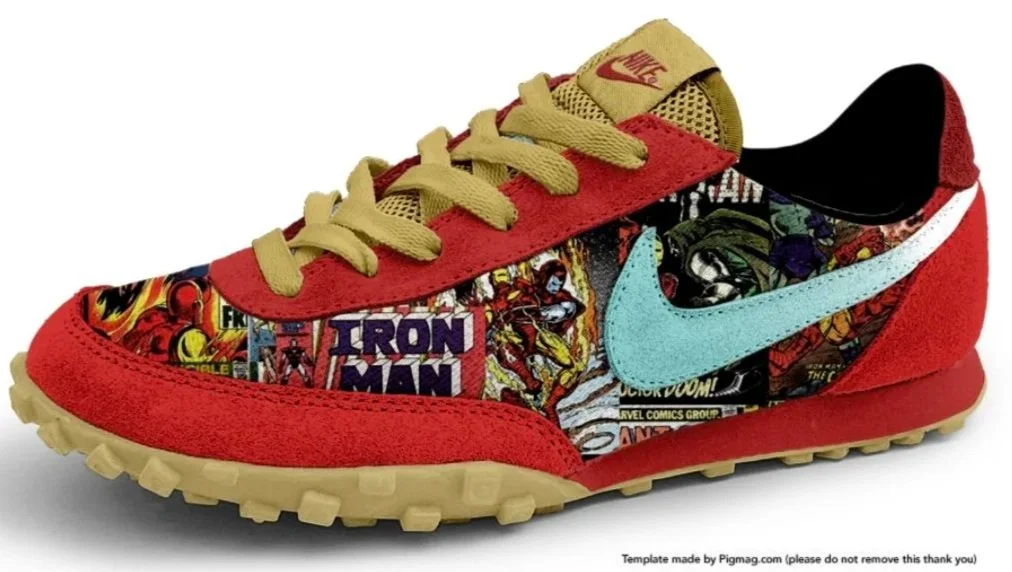 A Nike sneaker with a Marvel comic book pattern including superheroes and logos, red suede accents, beige laces, and a light blue Nike swoosh.