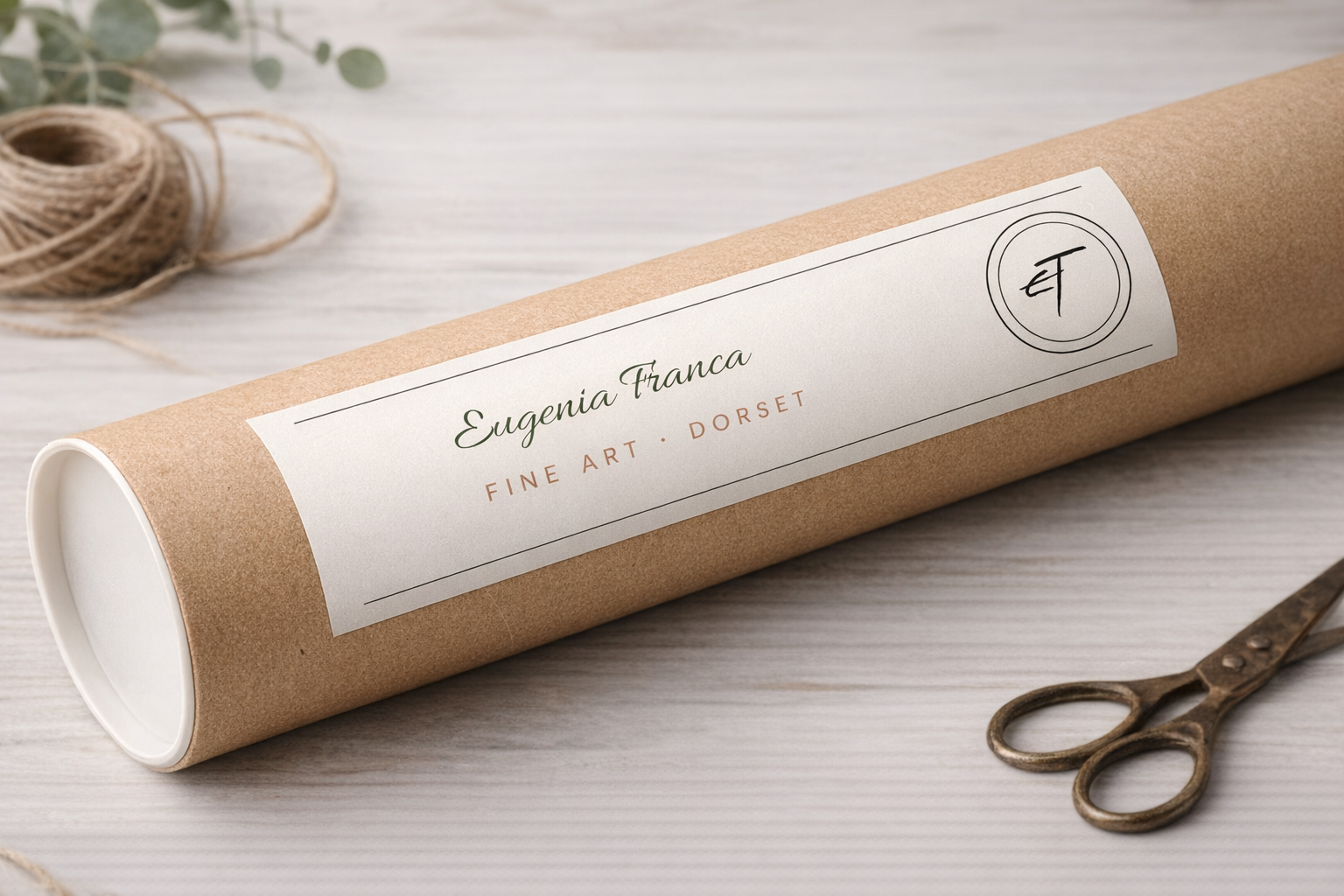 Fine art print packaging in a branded mailing tube with twine and scissors, showing tracked UK and worldwide delivery