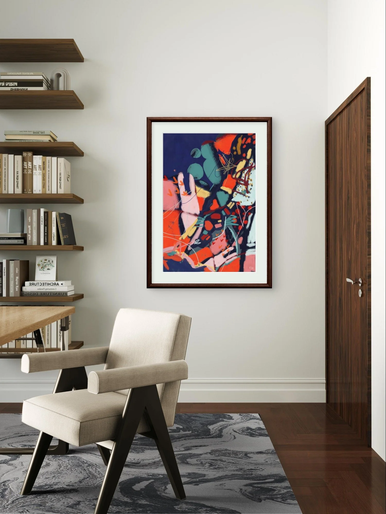 'See With Fresh Eyes' fine art abstract print hanging in a modern office entry with a white armchair, books on wall-mounted shelves, and a black and white patterned rug.