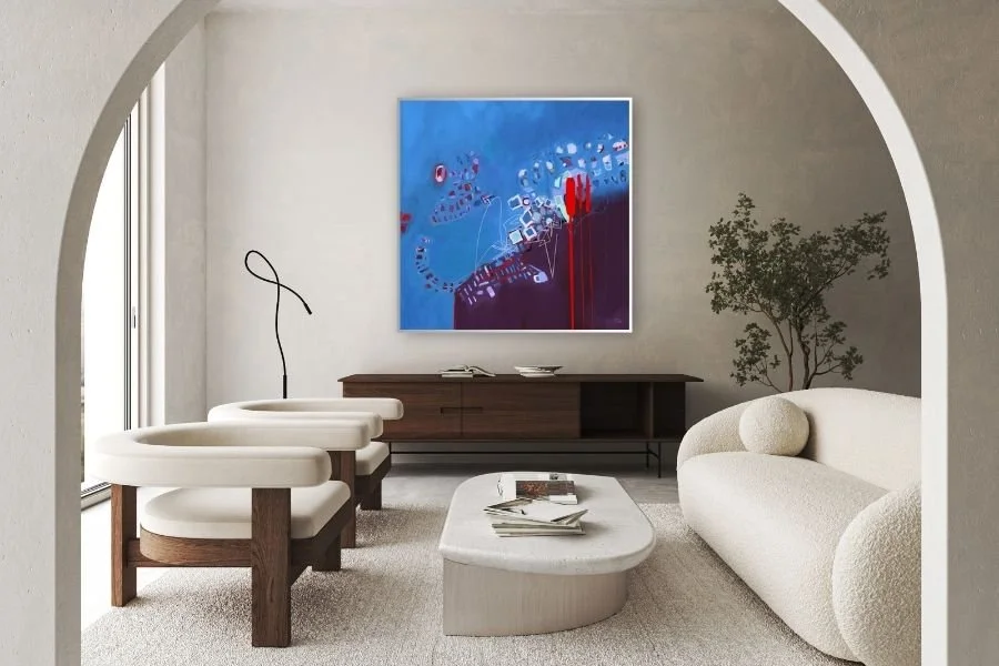 A small, restrained pop of red used thoughtfully in a neutral room
