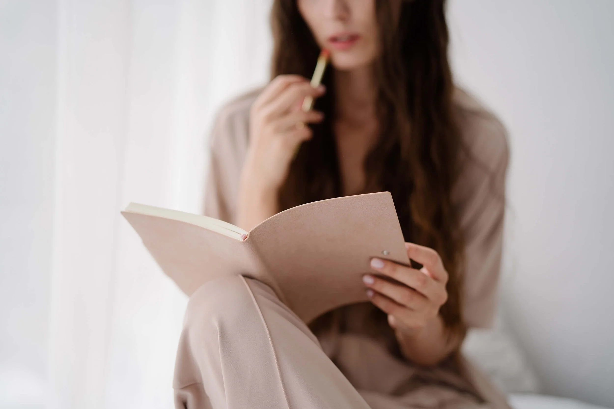 Thoughtful planning session with a notebook.