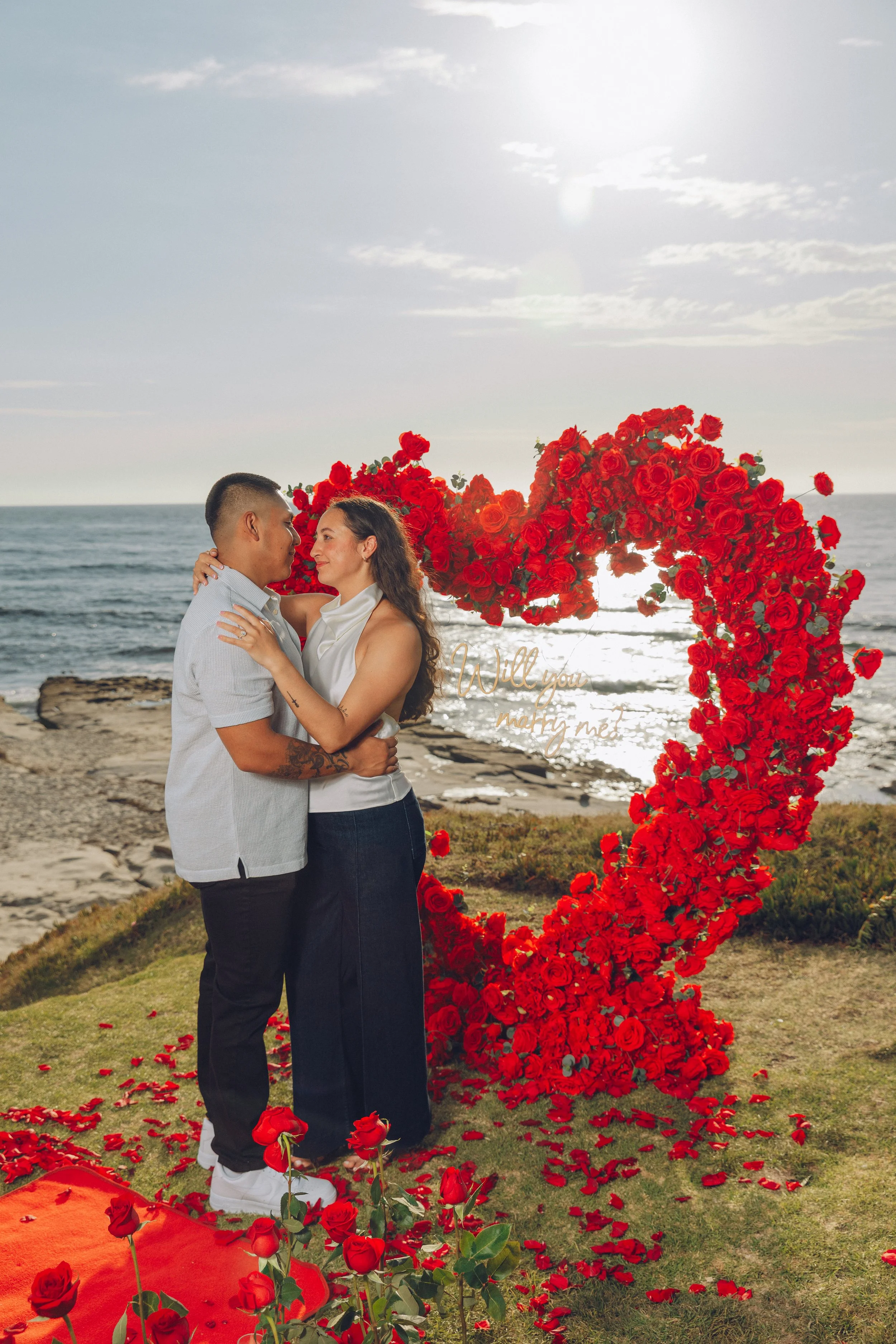 Carlsbad beach engagement photos.