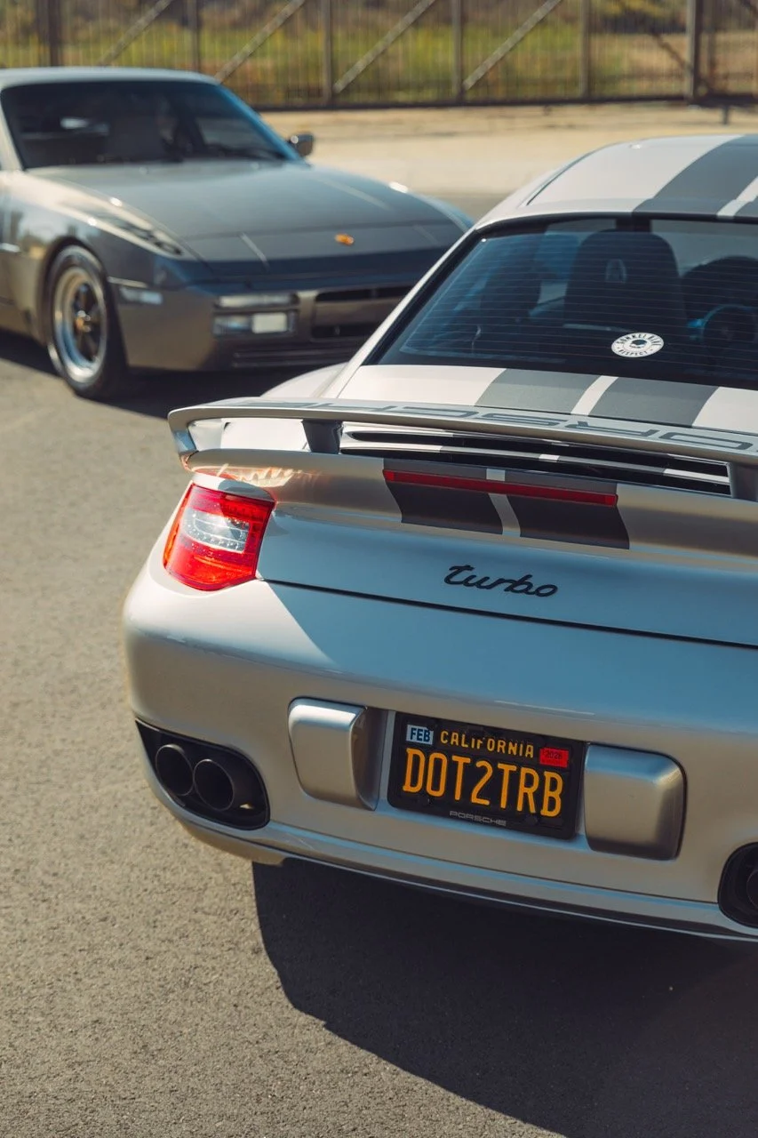 911 Turbo next to a Porsche 944.