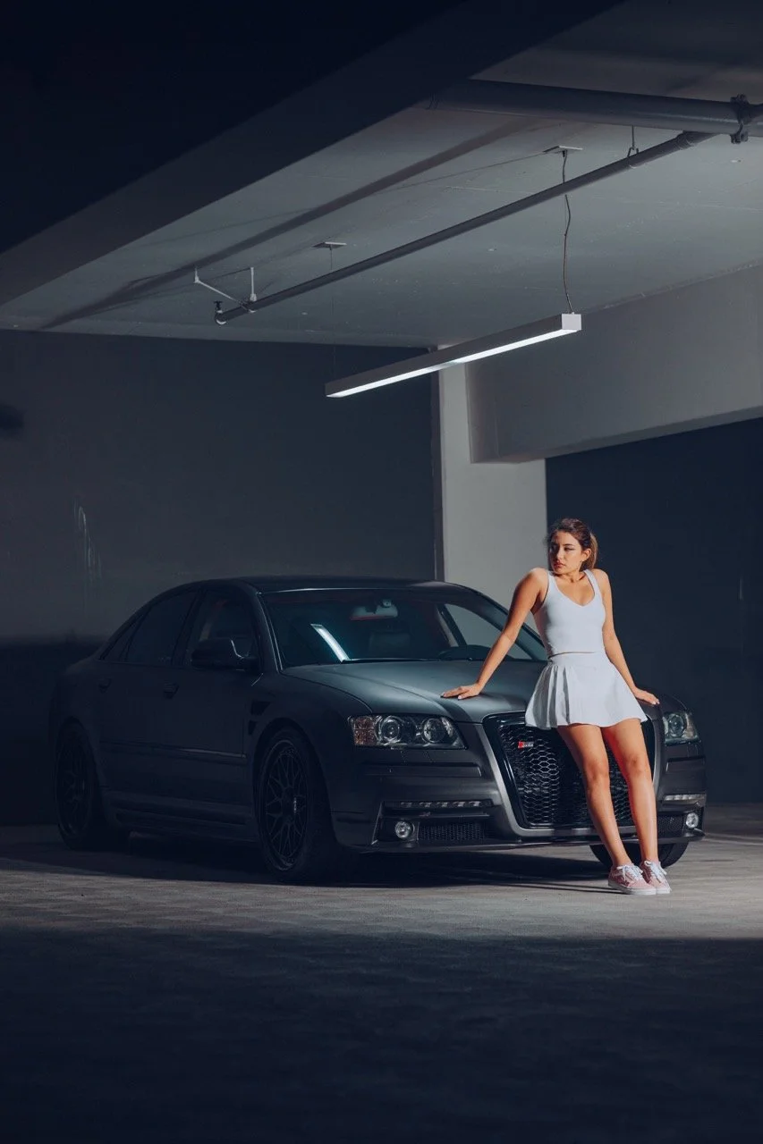 Model poses on an Audi S8.