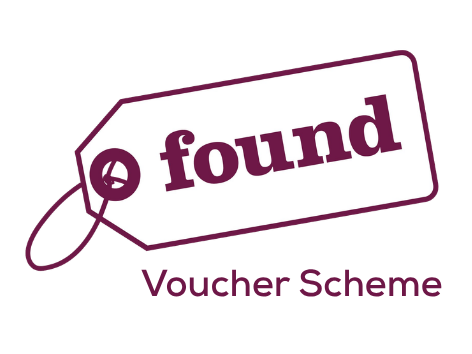 A graphic of a tag labeled 'found' with a string attached, and the words 'Voucher Scheme' underneath.