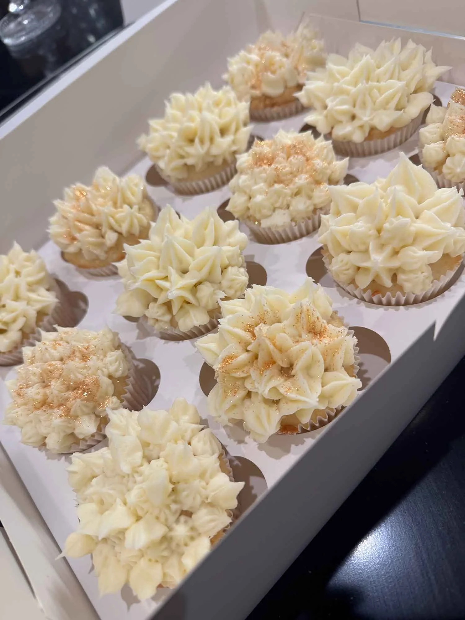 Vanilla Cupcakes with Champagne Frosting