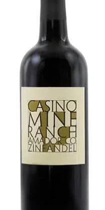 Bottle of Casino Mine Ranch wine with a beige label and black cap.