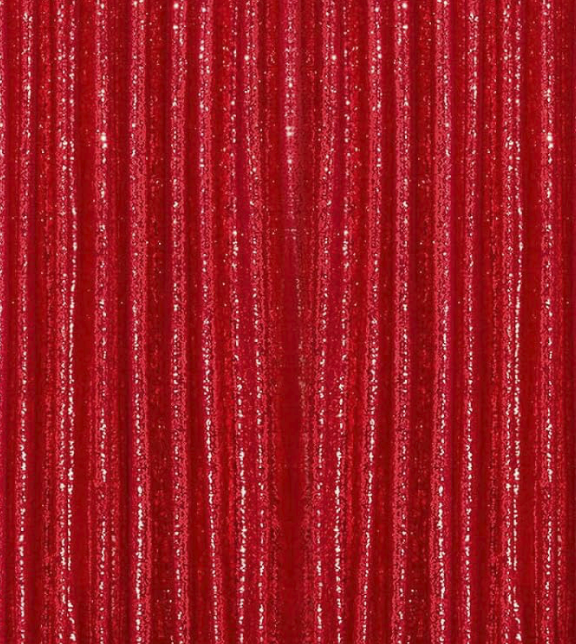 Close-up of red sparkly curtain with vertical lines.