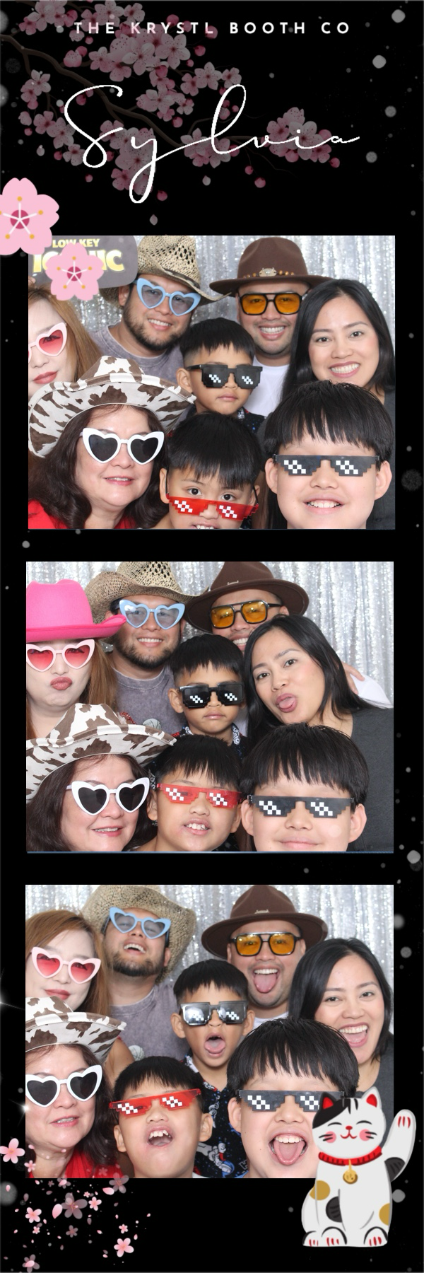 Photo booth strip with people wearing fun accessories like sunglasses, hats, and making silly faces against a silver sequin background, themed 'Sylvia' with cherry blossom graphics.