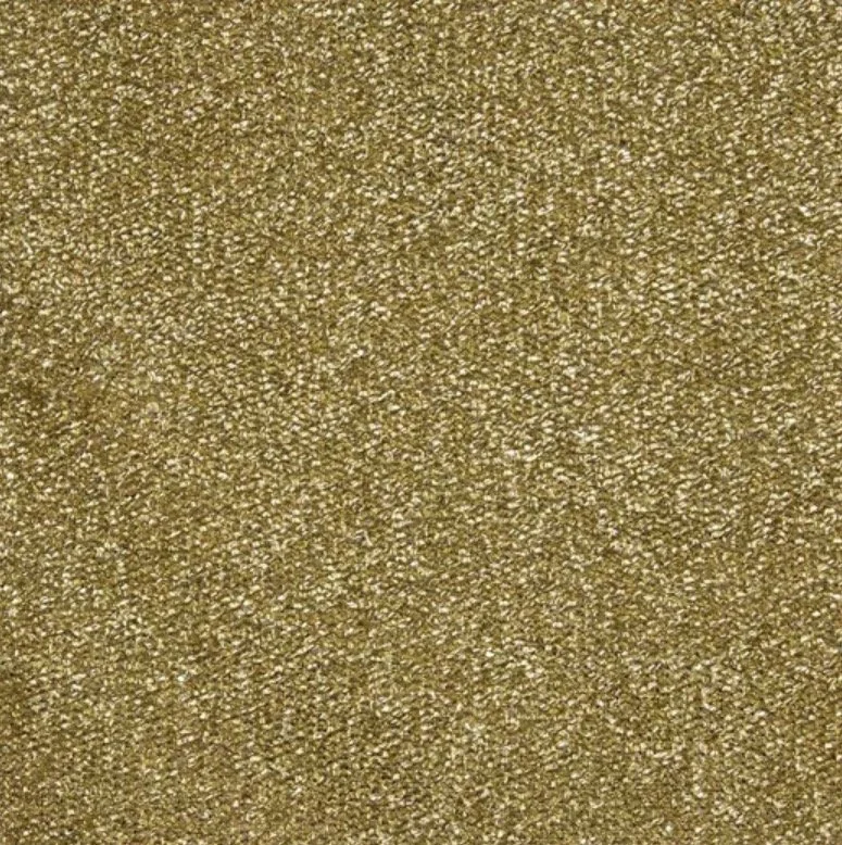 Close-up of a textured, glittery gold surface.