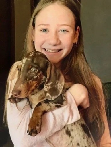 Dauple+dachshund+with+new+owner.jpg