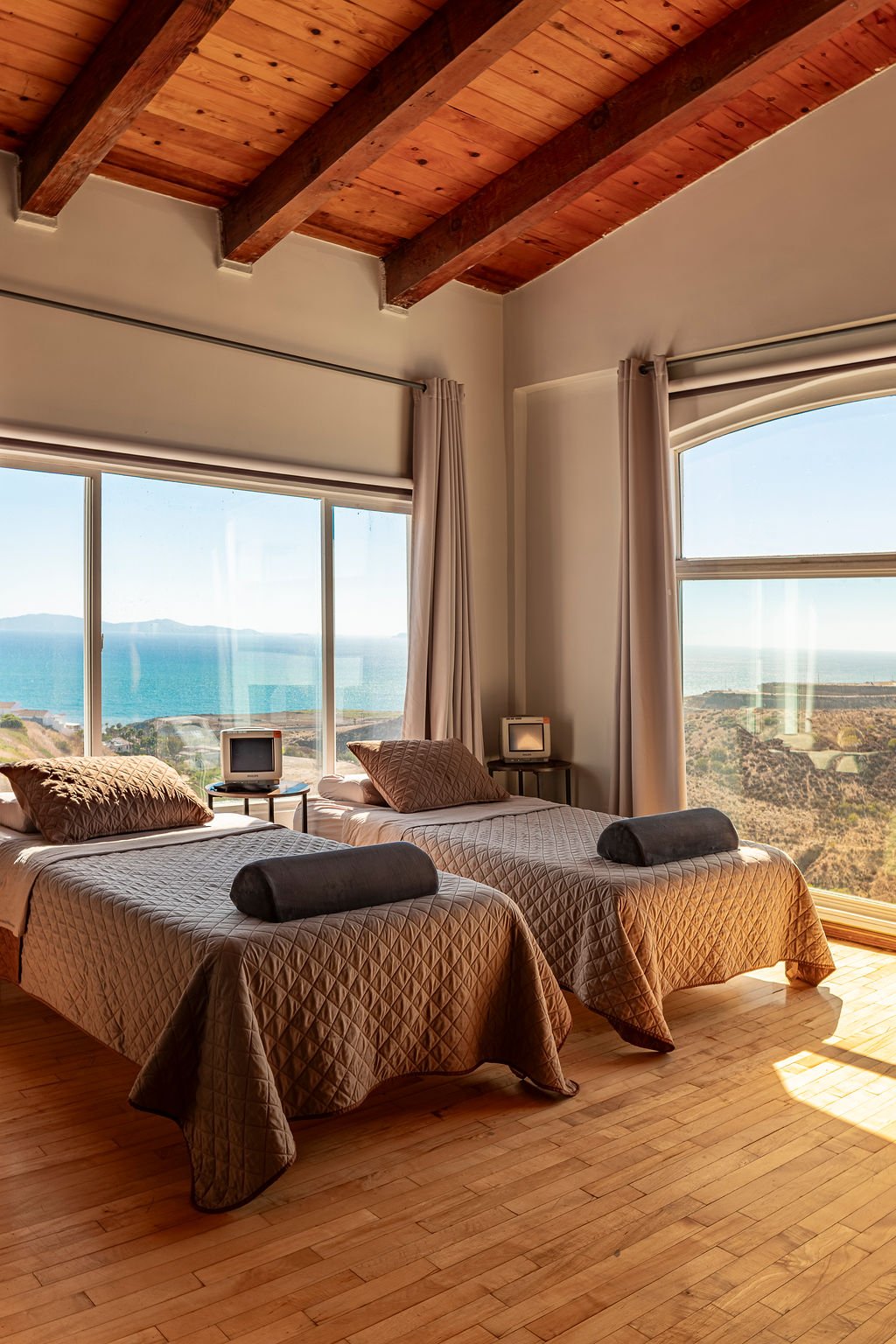 Beds in ocean view room for ibogaine retreat including cardiac monitors at The Mission Within retreat