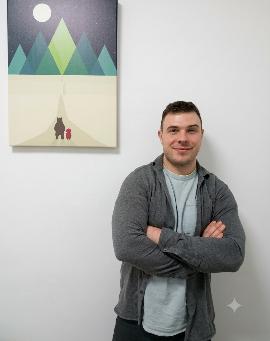 A counsellor standing proudly, representing his opening and welcoming anxiety depression treatment space .