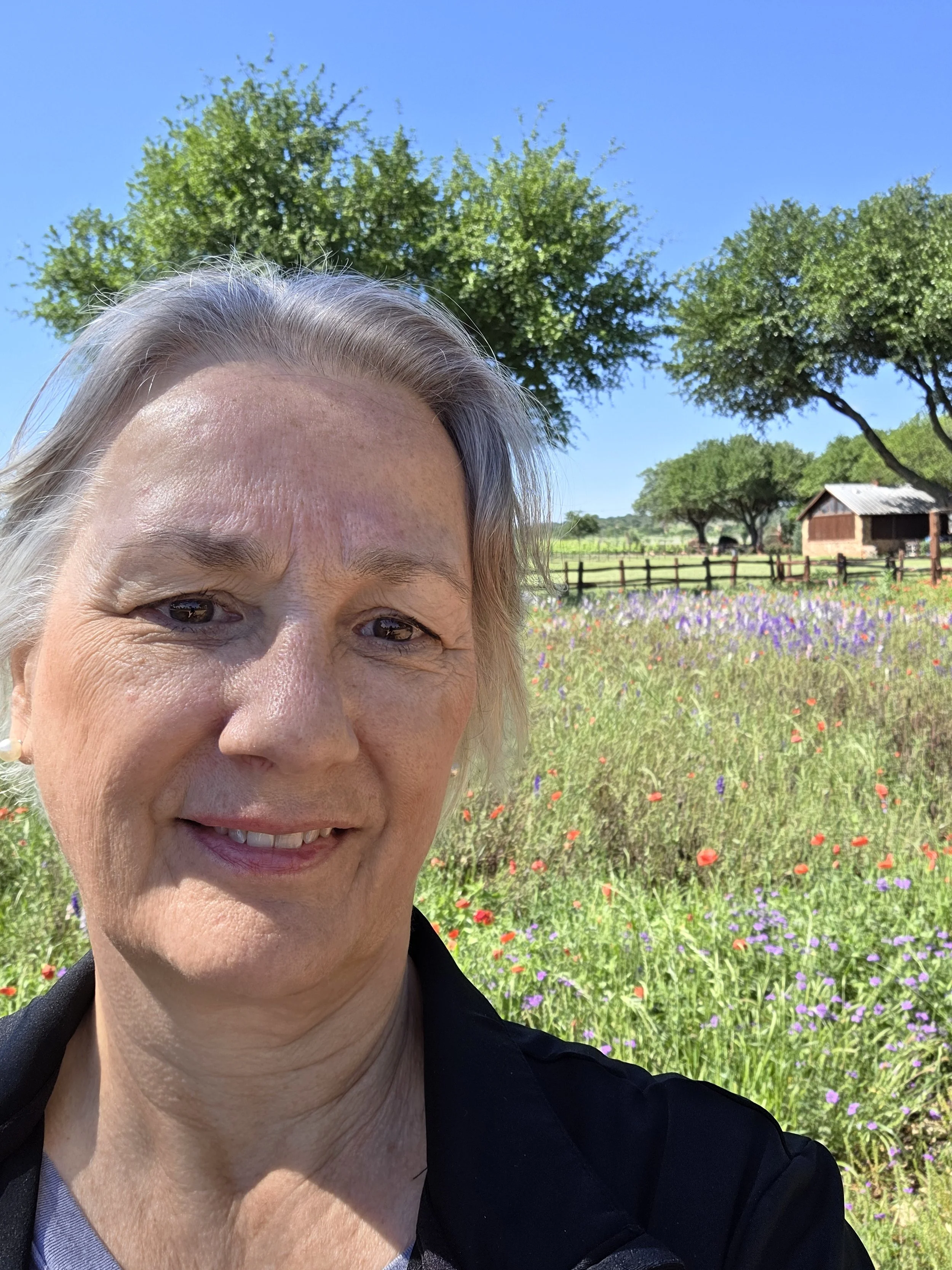 Patty enjoying  wild flowers