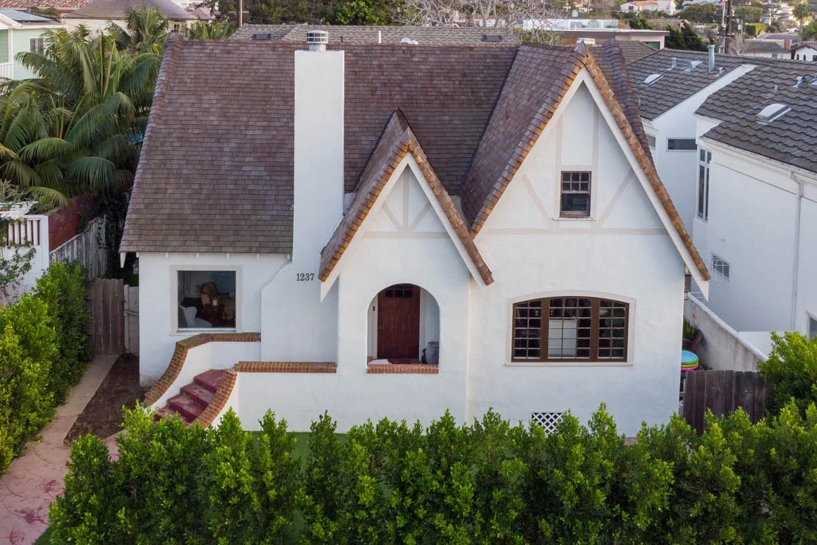 white Tudor revival house