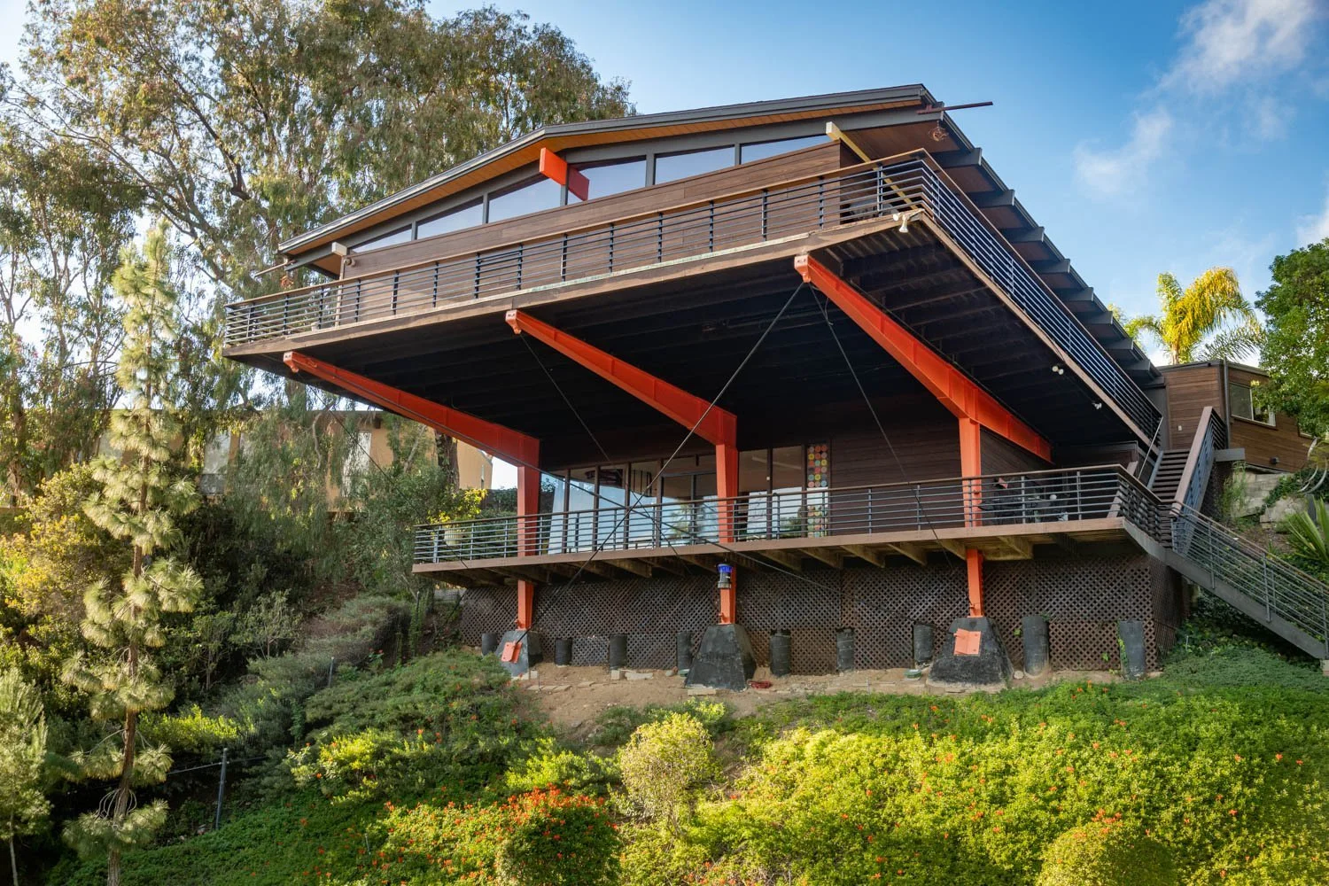 modernism house with red post and beam
