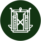 White icon of a squeeze chute on a dark green circular background.