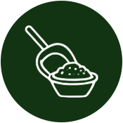 Plastic container with a spout and a bowl of food, against a dark green background.