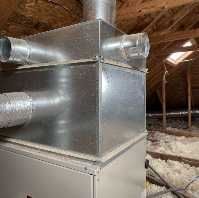 cracked sheet metal plenum beside residential air handler