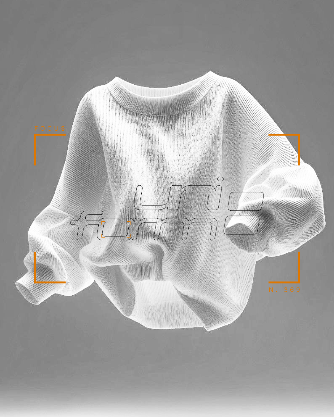 Un sweatshirt blanc posé sur une surface avec un fond gris. Sur l'image, il y a des annotations en orange indiquant des zones de mise au point et du texte, notamment 'FOCUS' et 'N. 369'.