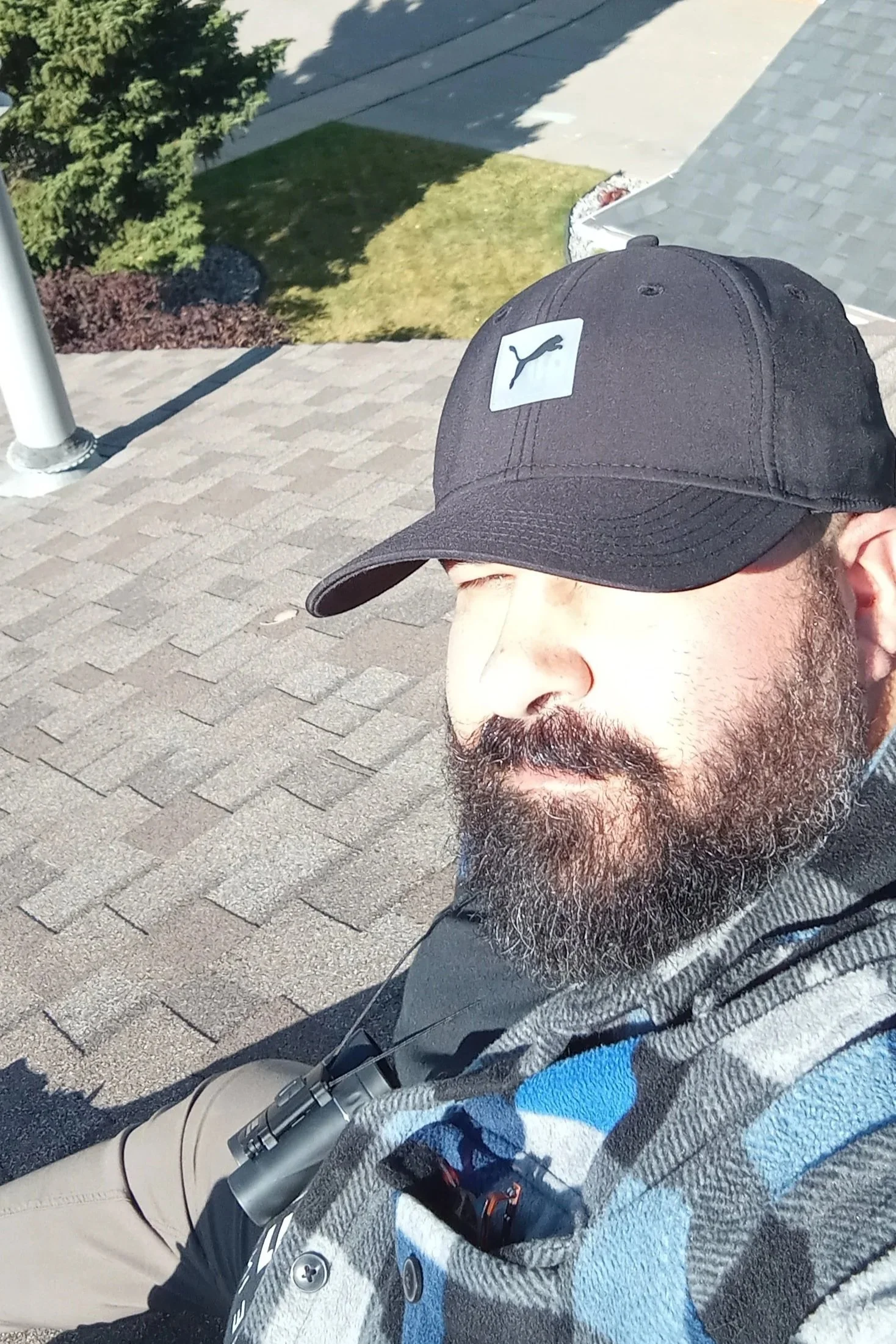 Home inspector on roof