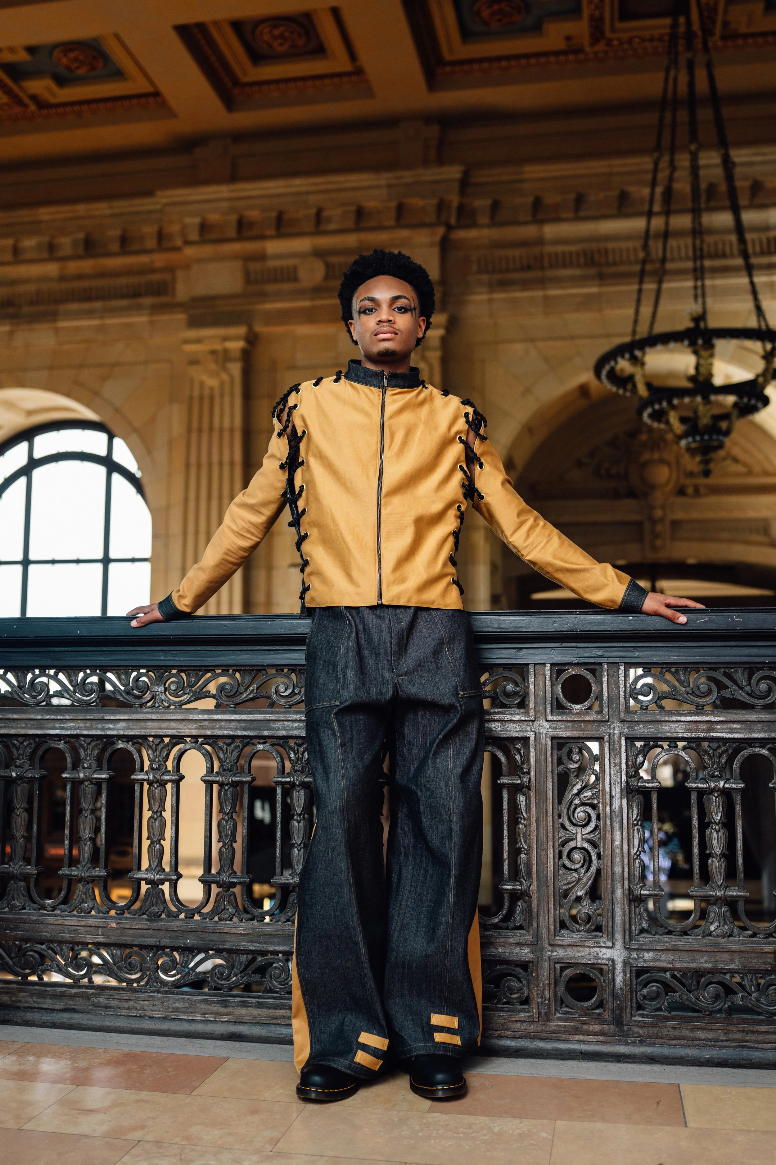 This Jacket and Jean combo is made with black denim and a tan canvas. With deconstructed sides and sleeves that are connected with crochet black paracord. 
